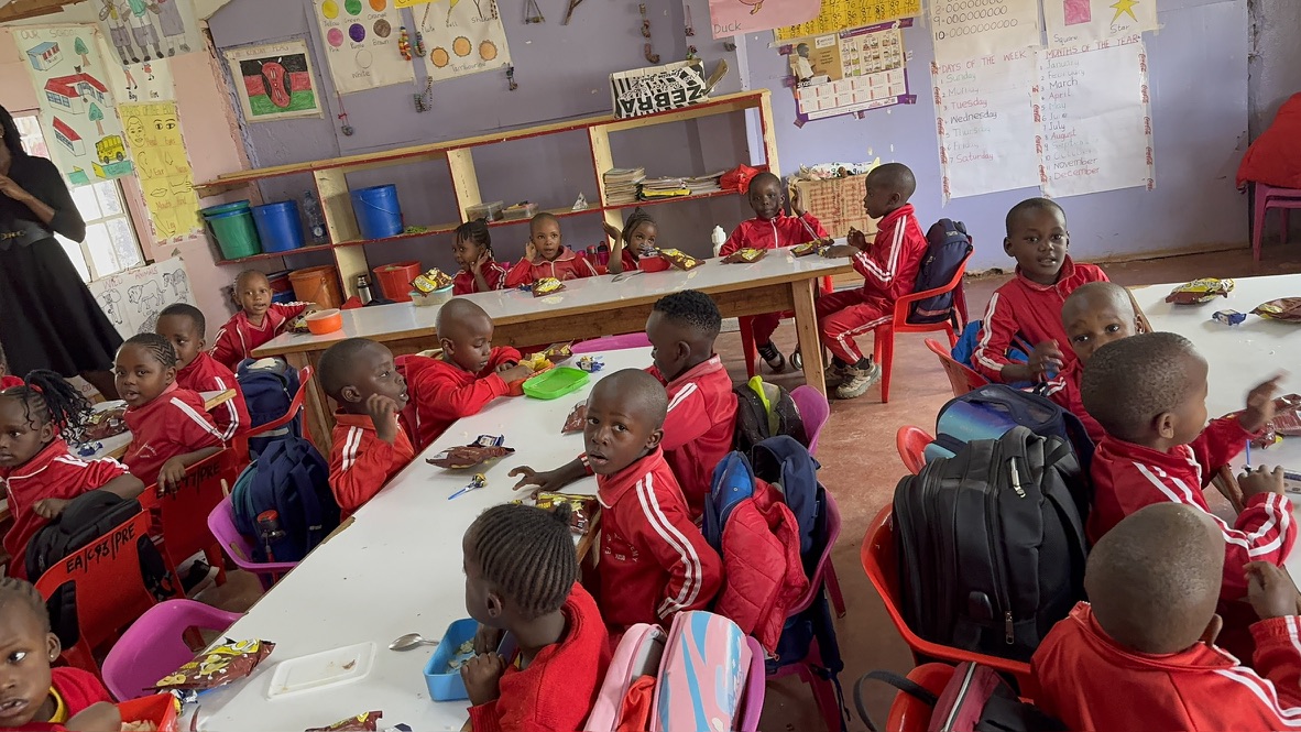 Students walking through The Elimu Academy campus